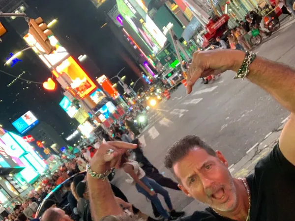 Mike Millett and Rob Lancit in a night selfie in Times Square